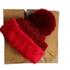 Bonnet pompon rouge