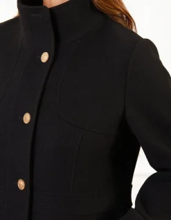 Manteau chic noir boutons