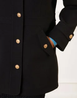 Manteau chic noir boutons