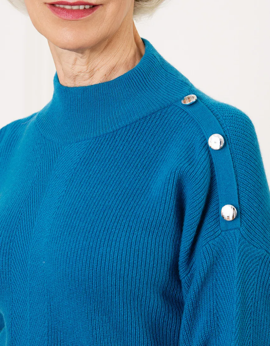 Pull chaud bleu boutons