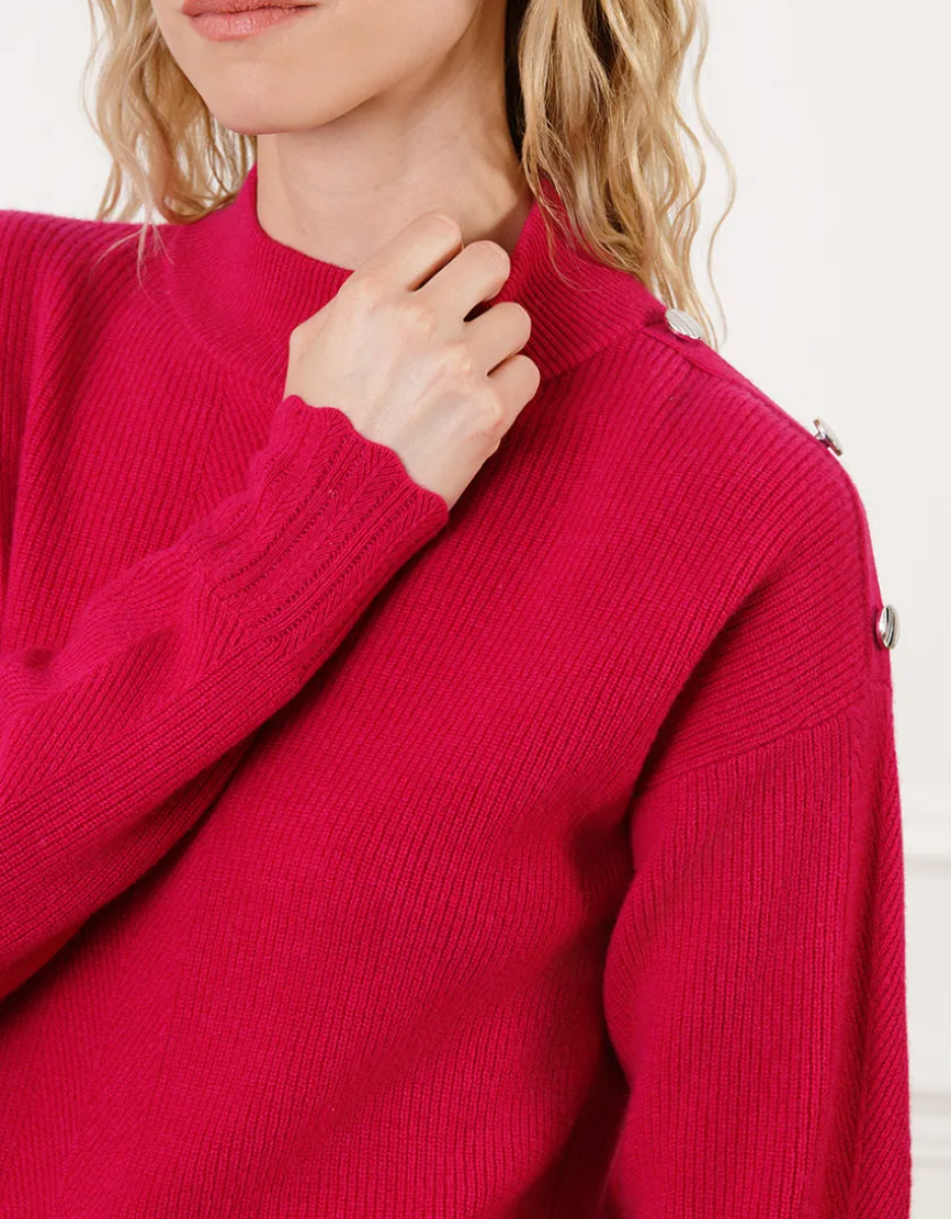 Pull chaud rose boutons